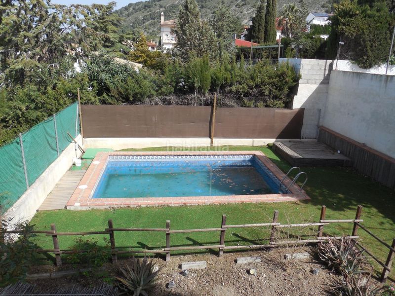 Foto 4b8154ea-fc97-4c00-98e7-c2e2e512b653. Casa pareada  con jardín y piscina en el puntal en Padul