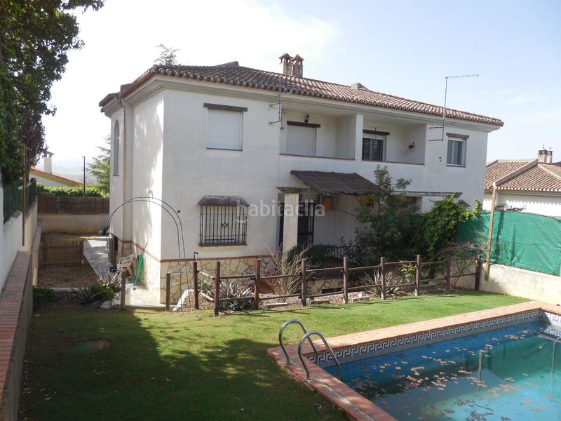 Foto 5eace5b3-331b-46c4-b28a-f8e0b29c76e2. Casa pareada  con jardín y piscina en el puntal en Padul