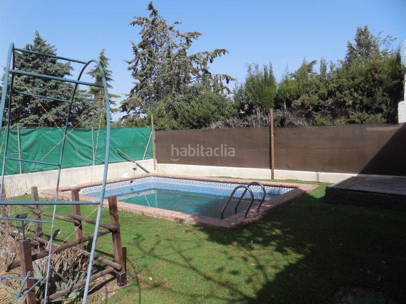 Foto 6b795e0f-19a1-41d0-82af-46b68d781013. Casa pareada  con jardín y piscina en el puntal en Padul