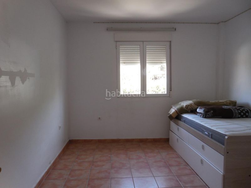 Foto cad0f39a-b4ee-4808-9421-6daf63e3f306. Casa pareada  con jardín y piscina en el puntal en Padul