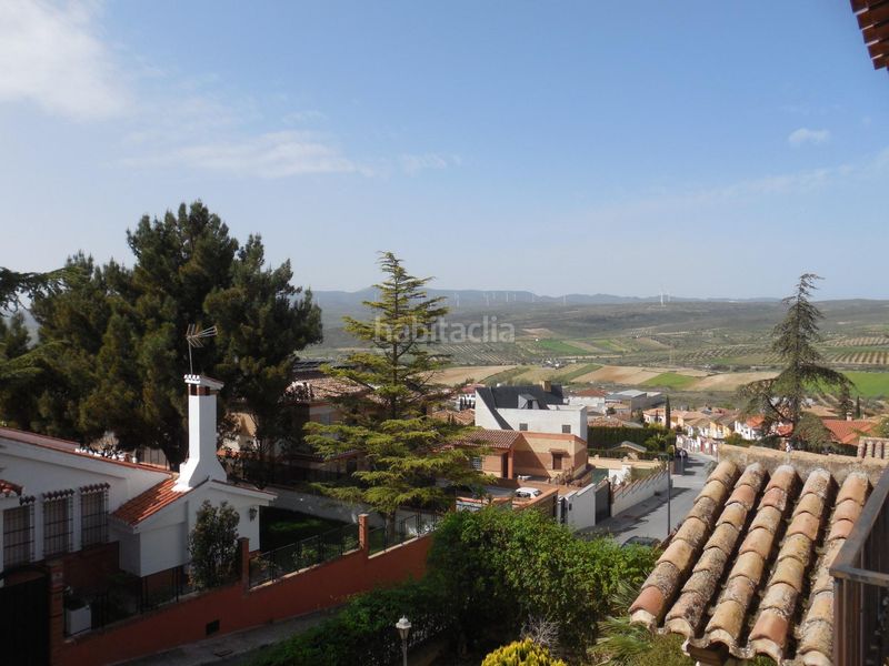 Foto e1f58c76-bef5-427c-bbe2-892a56adf914. Casa pareada  con jardín y piscina en el puntal en Padul