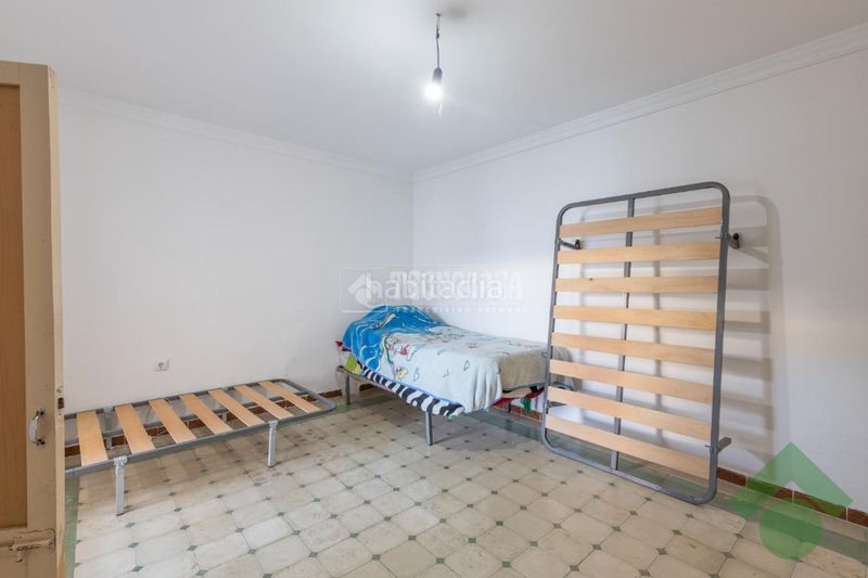 Foto a817d536-07b2-4658-a68d-c6bab050087b. Casa aparellada amb aparcament a Atarfe