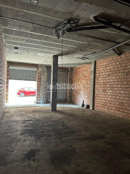 Foto f8764b3f-8365-49ee-ba05-af3895e5a324. Local comercial almacén en venta en Atarfe