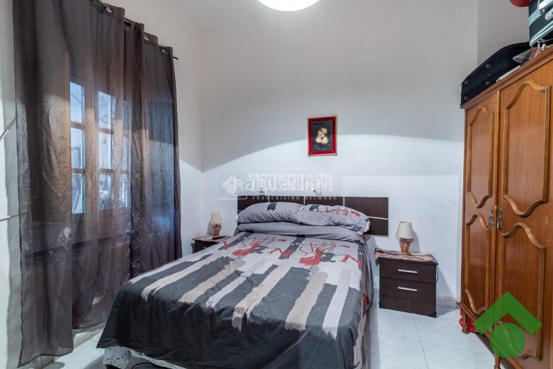 Foto 6ba1f8a4-0ca5-4535-8139-e0c5e0fe6fb4. Casa aparellada amb aparcament a Pinos Puente