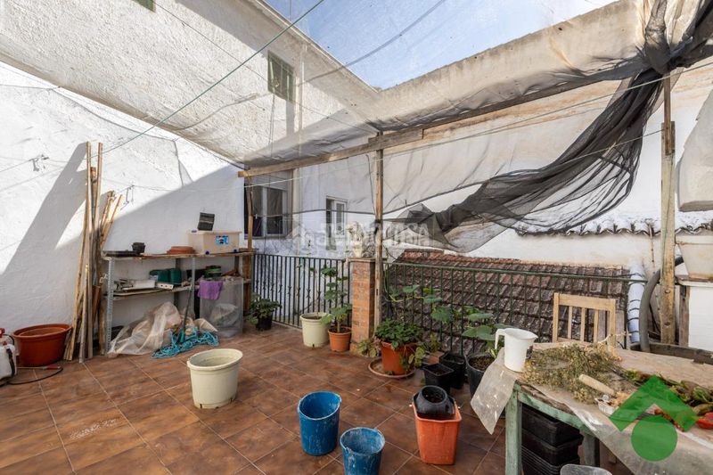 Foto bc45ca86-7963-482e-b0a8-cac0afe16706. Casa aparellada amb aparcament a Pinos Puente