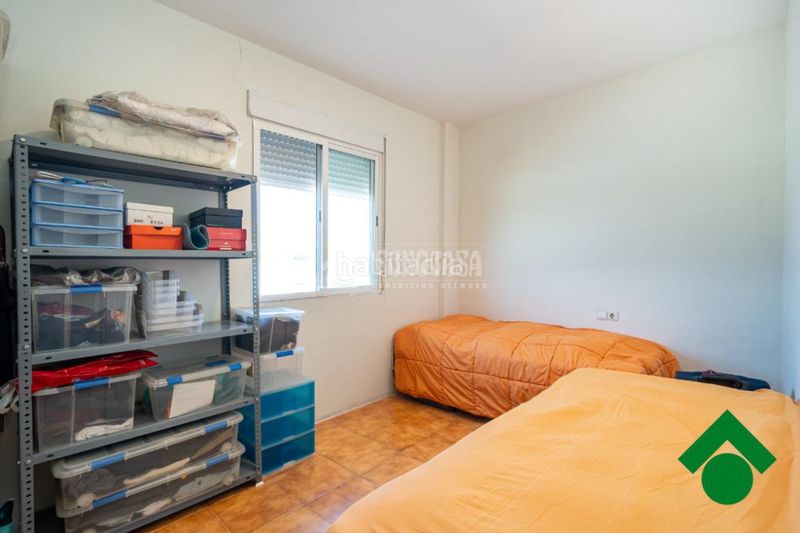 Foto b588c970-3d4d-4380-9444-ac99511c71c3. Casa aparellada amb aparcament a Atarfe