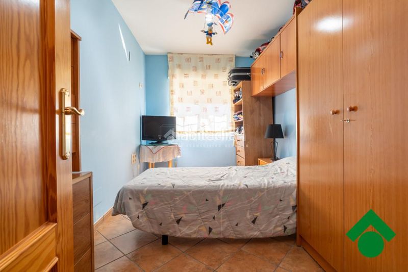 Foto 2d4a9c66-c6f4-4720-bd3b-874e8f3aa114. Casa aparellada amb aparcament a Atarfe