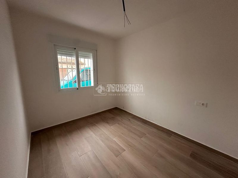 Foto e522e62a-d9ae-471f-a899-0db2e49efaff. Casa aparellada a Atarfe