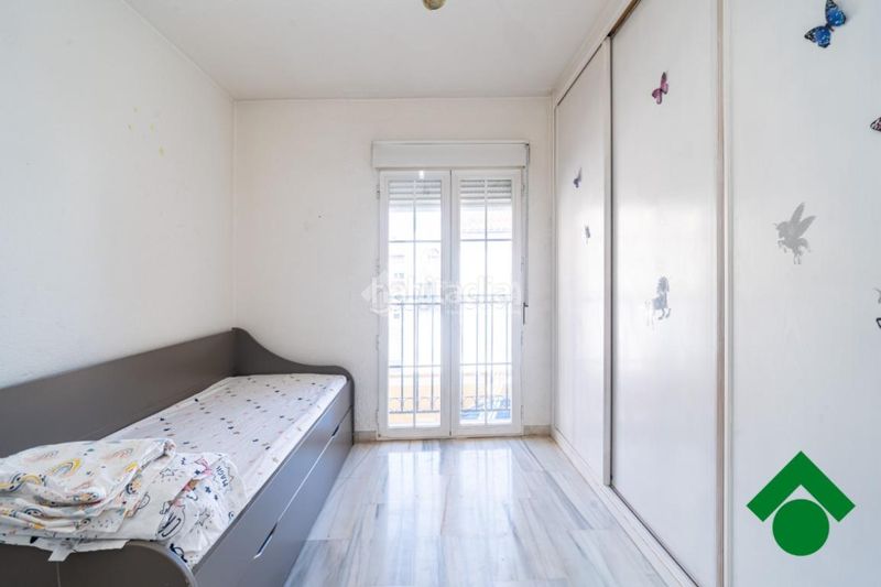 Foto c0af71c4-e16d-44b6-a379-d2dc1125fa9e. Casa aparellada amb aparcament a Atarfe
