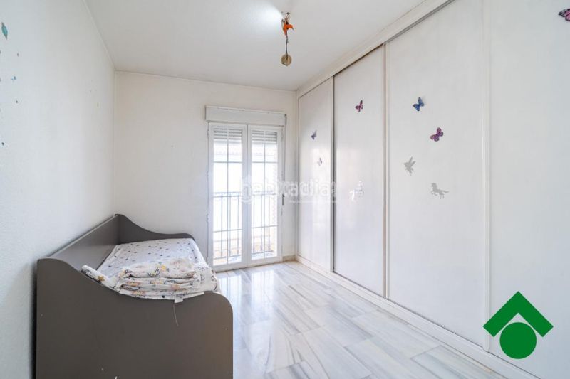 Foto ceb39ebb-b2f3-4e6a-803c-6e8069af358e. Casa aparellada amb aparcament a Atarfe