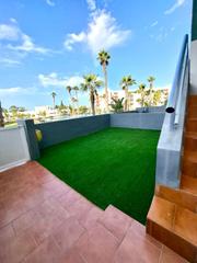Piano terra en Almerimar. Venta apartamento con jardn
