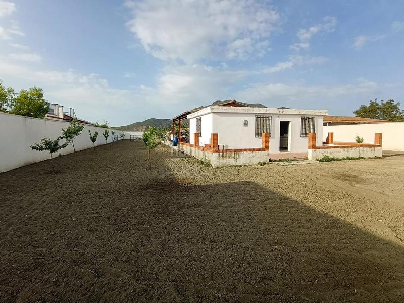 Foto 3c067d92-cabb-407d-bcb5-7fcefa53b1ec. Finca rústica coqueta parcela de campo con luz y agua en Pinos Puente