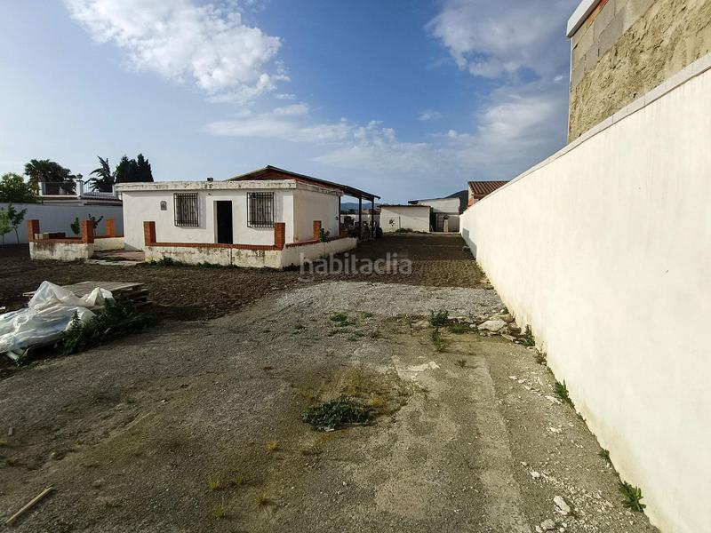 Foto 59d2f5c6-7a26-4b6f-a9fb-40b2a5756863. Finca rústica coqueta parcela de campo con luz y agua en Pinos Puente