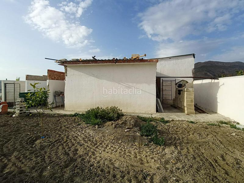 Foto 92130c98-19c8-4337-a88e-24eb5cf17aad. Finca rústica coqueta parcela de campo con luz y agua en Pinos Puente