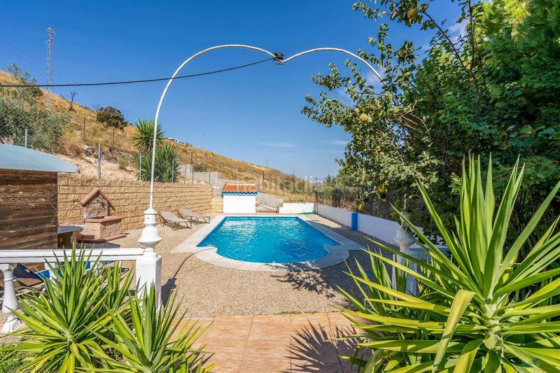 Foto 1cbef24e-18ce-4ca1-b8c2-203608c9b33b. Masía finca muy bonita con 4 casas y piscina en Padul