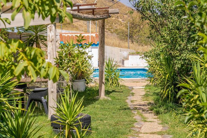 Foto bc2fe1d6-fd85-4cfa-a60f-34ef17c5dbea. Masía finca muy bonita con 4 casas y piscina en Padul