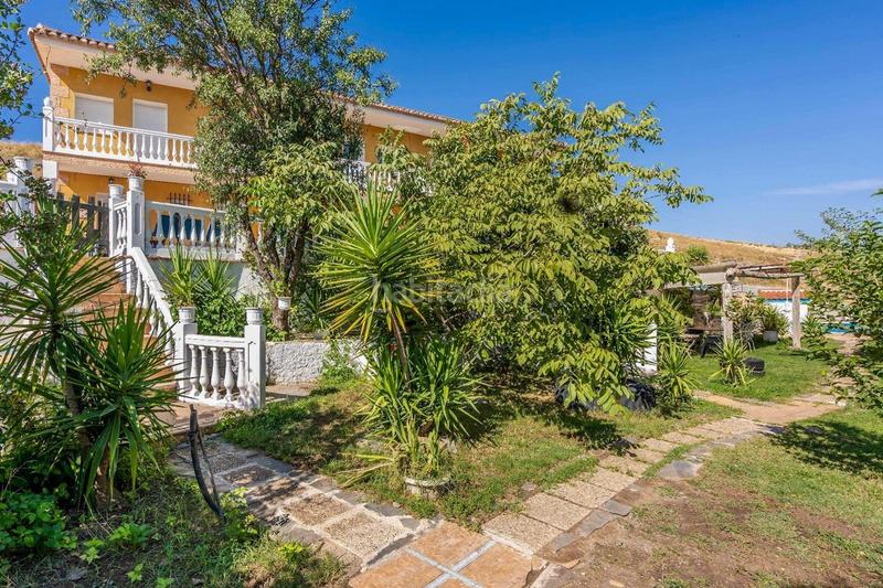 Foto ccdd2a1d-0d53-4b05-85d2-d6134a444c9d. Masía finca muy bonita con 4 casas y piscina en Padul