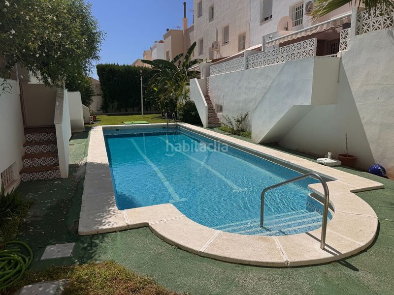 Foto 98c3e264-da98-4463-bfc2-9bafa701cbdd. Casa adossada amb aparcament piscina a Aguadulce Sur Roquetas de Mar