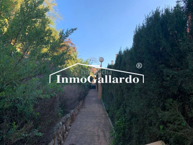 Foto 974f39ca-f6e7-4db9-9380-c4cc66f4c6fc. Casa aparellada amb calefacció aparcament a Pinares de San Antón Málaga
