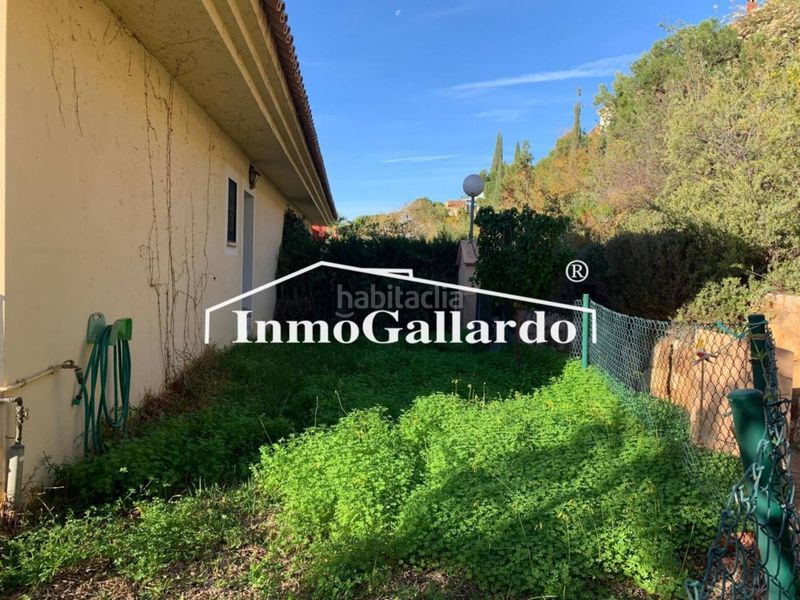Foto d32c86af-43e5-4673-bd0a-8db5a3fb723e. Casa aparellada amb calefacció aparcament a Pinares de San Antón Málaga