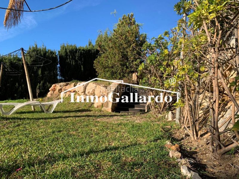 Foto f5dd62cb-f6bb-4eaf-b56e-d6a87c28fa23. Casa aparellada amb calefacció aparcament a Pinares de San Antón Málaga