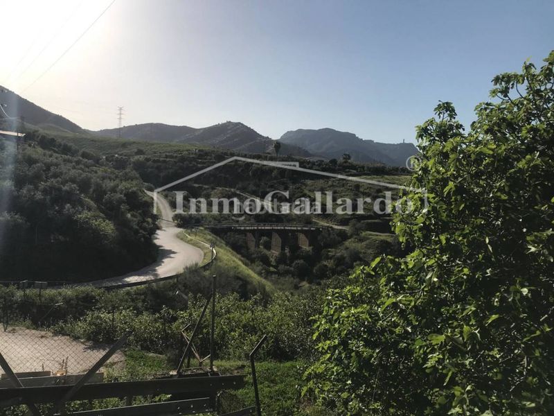 Foto 5e3a43a9-c847-41ef-be93-feb395e4a4df. Casa amb aparcament a Álora