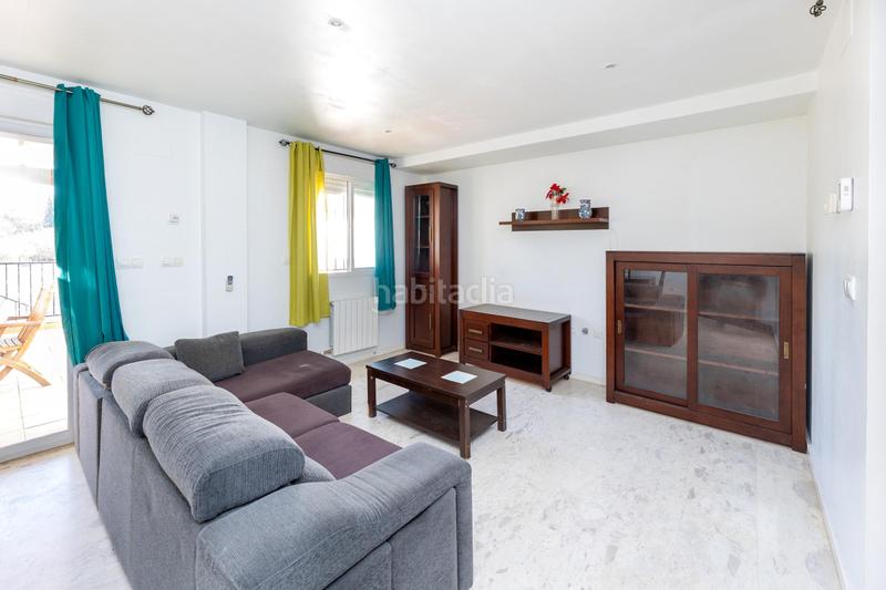 Foto f63a98d2-74fc-401a-a7a5-f1663a28203e. Casa a schiera con parcheggio piscina in Atarfe