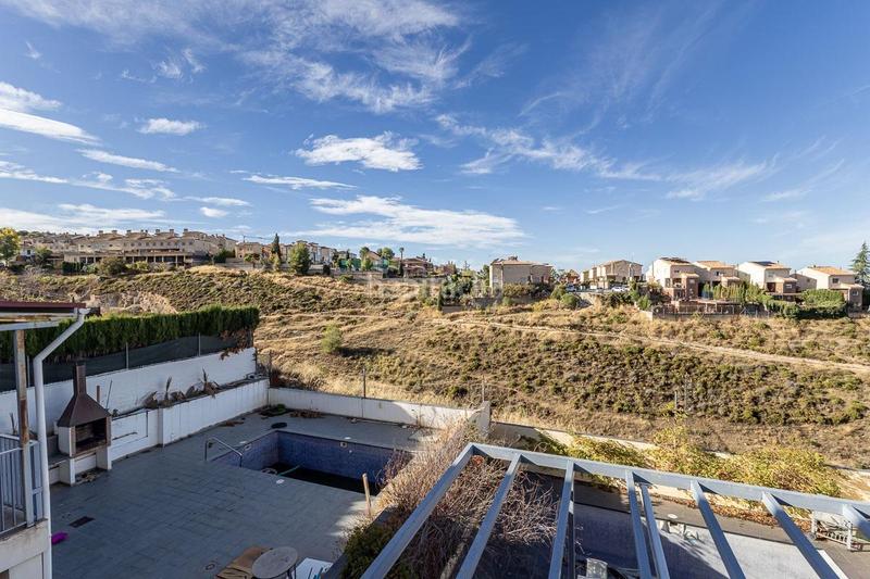 Foto ba6d72cf-0bd3-4d89-a823-f745596d9110. Casa con riscaldamento parcheggio piscina in Barrio de la Vega Monachil