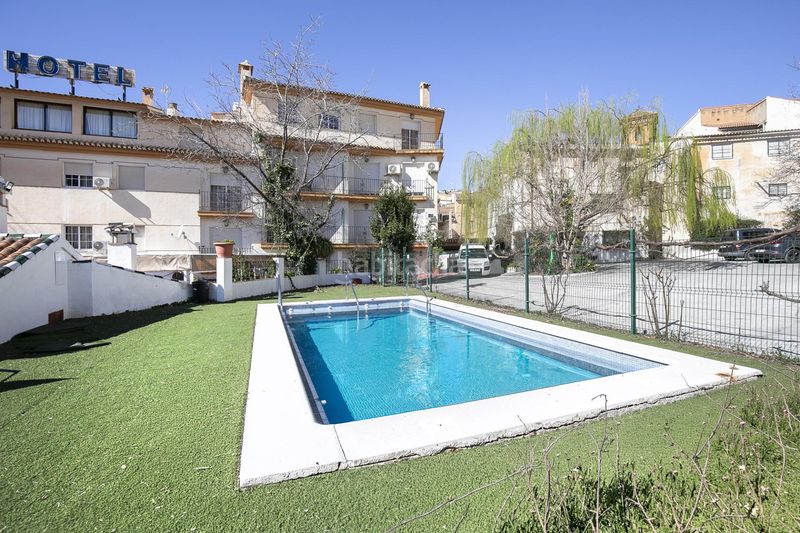 Foto c815b376-15f5-4eaa-87be-a0f5645ef266. Edificio in Güéjar Sierra