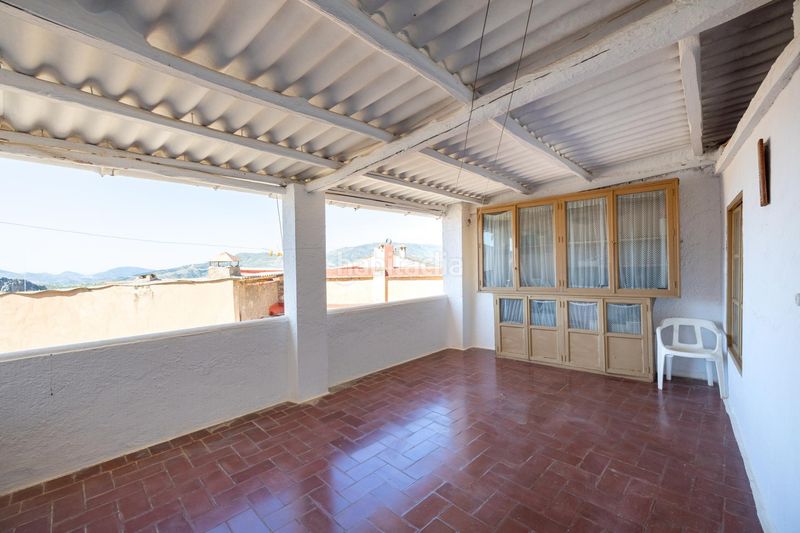 Foto 3a666189-e57d-411f-b36d-91dd2d3d6941. Casa aparellada a Lanjarón