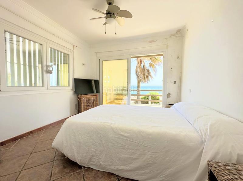 Foto 33a25f7e-f58f-49c1-9ed3-167ba9289913. Casa exclusiva villa en primera línea de playa en Manilva