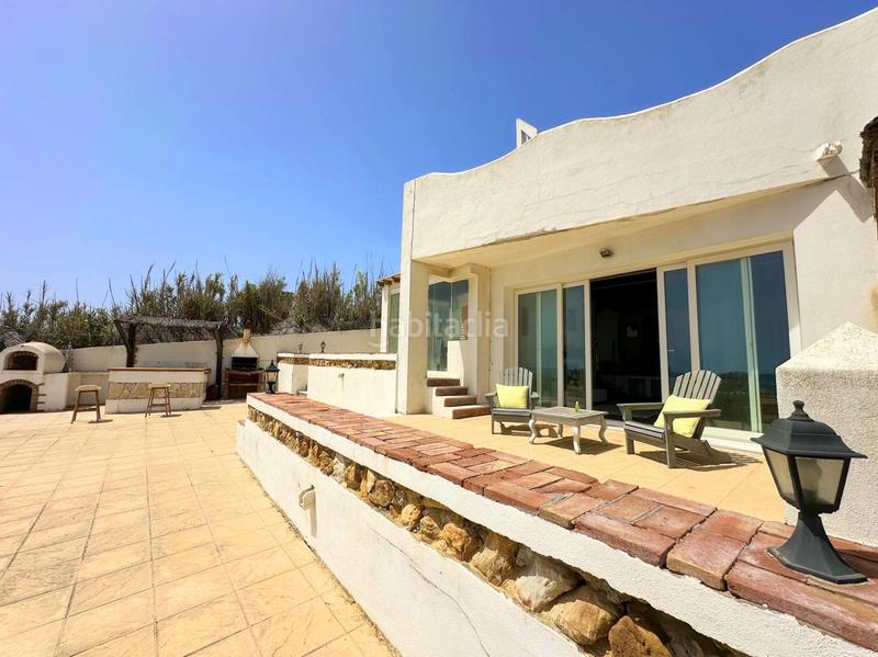 Foto 67a7d2ba-2a96-4ecf-bfe9-06c8f5d8205f. Casa exclusiva villa en primera línea de playa en Manilva