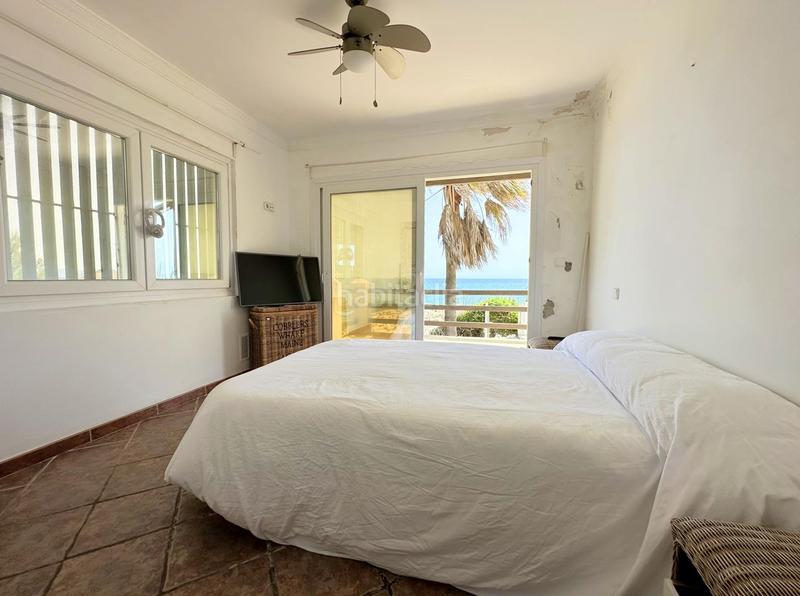 Foto 8da81f3f-6052-47aa-a661-6485d4eddd64. Casa exclusiva villa en primera línea de playa en Manilva