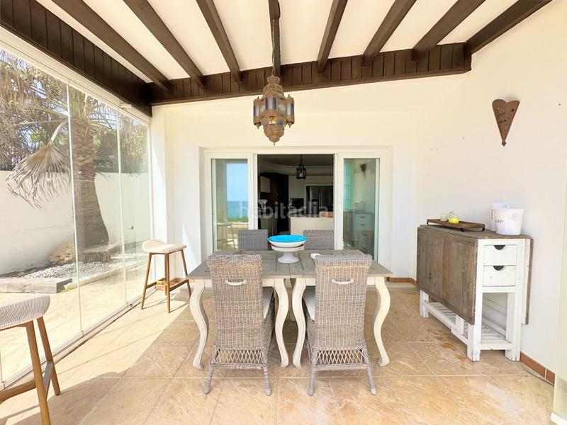 Foto e0a8092a-c189-4438-aa13-36b35d4bf920. Casa exclusiva villa en primera línea de playa en Manilva