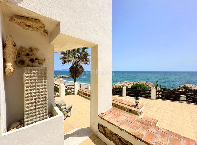 Foto e65f5d03-c400-42bd-a7e5-6bf64ae6ff54. Casa exclusiva villa en primera línea de playa en Manilva