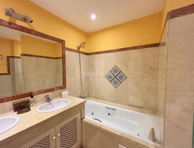 Foto 098dc4ae-9daf-4312-b1ec-0c465e8e7880. Apartamento exclusivo bajo en primera línea de playa con terraza privada costa con licencia vacacional. en Casares