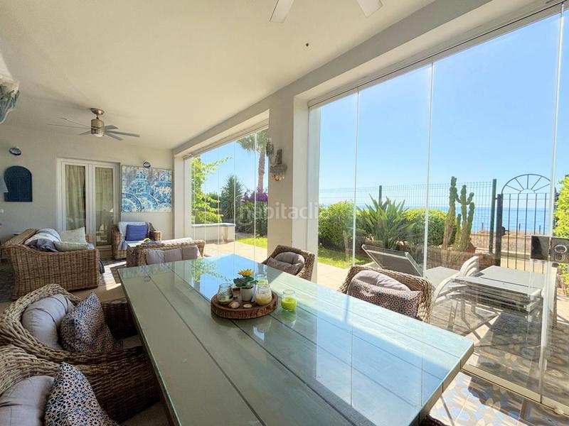 Foto 2dc01c68-0173-4f12-bb28-3778a22a4f9a. Apartamento exclusivo bajo en primera línea de playa con terraza privada costa con licencia vacacional. en Casares