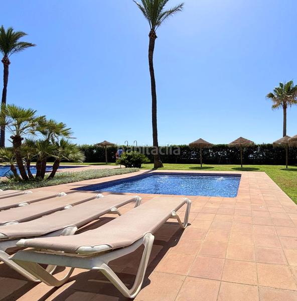 Foto 347bf172-705c-47cb-bdf1-50e11f26de16. Apartamento exclusivo bajo en primera línea de playa con terraza privada costa con licencia vacacional. en Casares