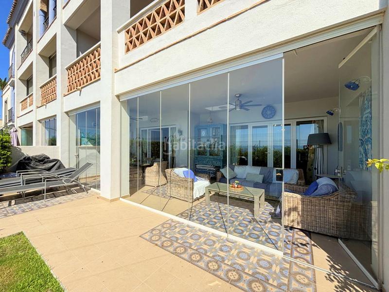 Foto 862f0564-26f6-4294-8892-057c7fbdab49. Apartamento exclusivo bajo en primera línea de playa con terraza privada costa con licencia vacacional. en Casares
