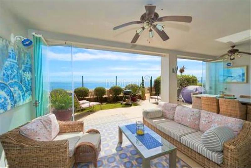 Foto ec44964c-fda8-44b8-b8a1-f3ff9a6282f1. Apartamento exclusivo bajo en primera línea de playa con terraza privada costa con licencia vacacional. en Casares