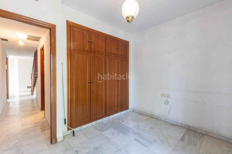 Foto 09e72065-af8c-4493-9392-57e5c33f1230. Casa pareada en calle de almajara 27 exclusiva vivienda con piscina en la zona del serrallo con piscina comunitaria en Granada