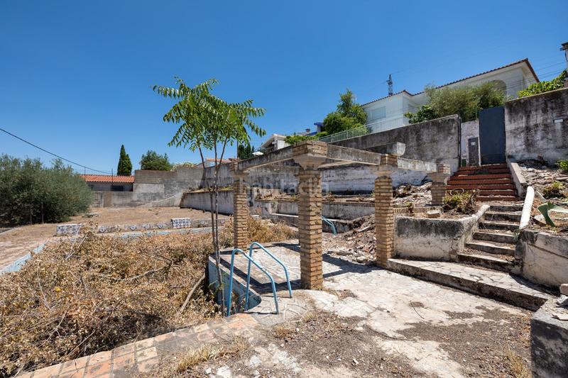 Foto b8afeb57-bf19-48fe-926d-18ce5a4d6a5b. Residential plot in Barrio de la Vega Monachil