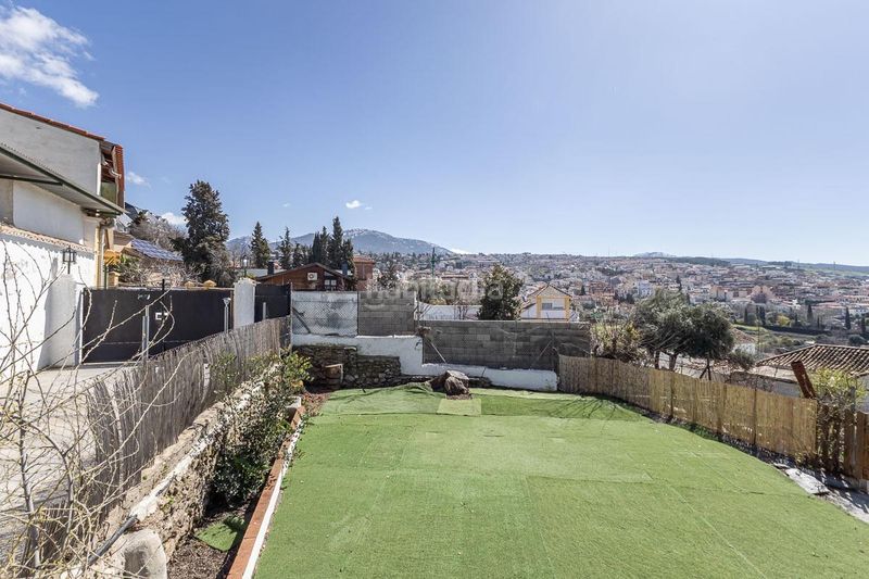 Foto 06ba6123-e272-42e7-b71d-a50c426df333. Casa amb aparcament a Barrio de la Vega Monachil