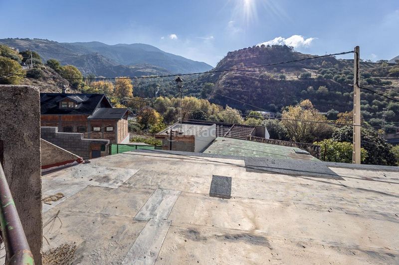 Foto cc457d40-b365-4f4e-b58a-0be5c70ea1d7. Casa amb aparcament a Monachil pueblo Monachil