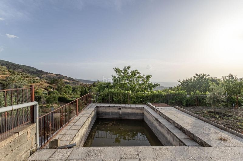 Foto f895af4a-136e-45f8-939b-a55d9876dbb6. Masia amb piscina a Monachil pueblo Monachil