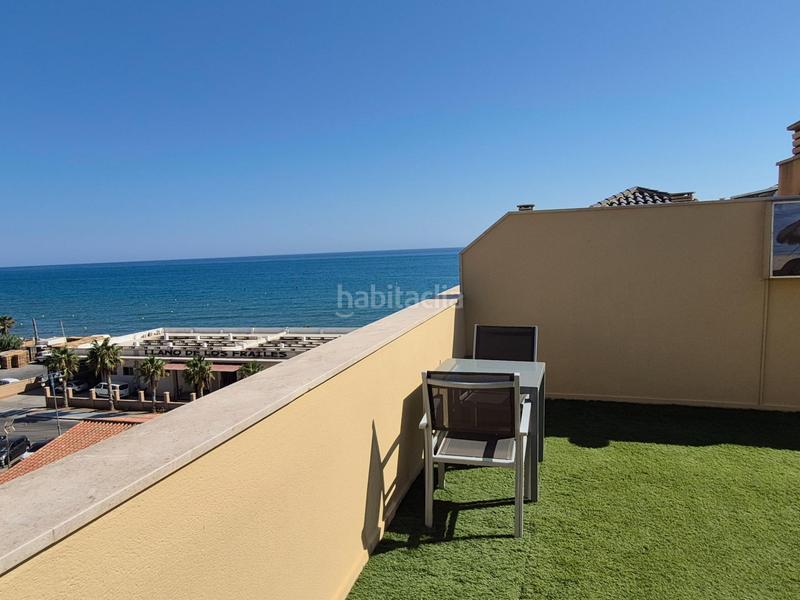 Foto f61a740f-154f-48d7-8808-ec17546c10f4. Ático estudioduplex en El Morche primera linea de playa en Torrox