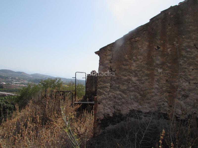 Foto f5a2a902-4378-41e6-a439-c5f479ad0c60. Finca rústica terreno con ruina cercana la playa en Benajarafe