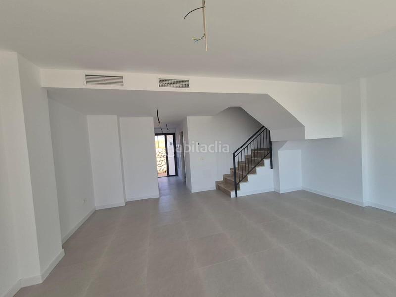 Foto ee397e4f-90af-4a50-af50-38072115db34. Casa a schiera con parcheggio in Viña Málaga Torre del Mar