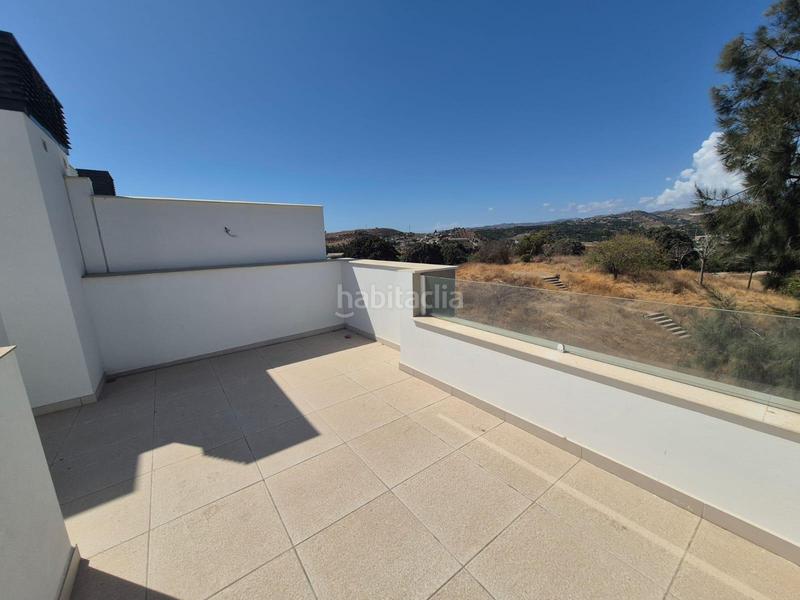Foto fa19c6b9-7d18-43c1-98be-32c455cdcf55. Casa a schiera con parcheggio in Viña Málaga Torre del Mar