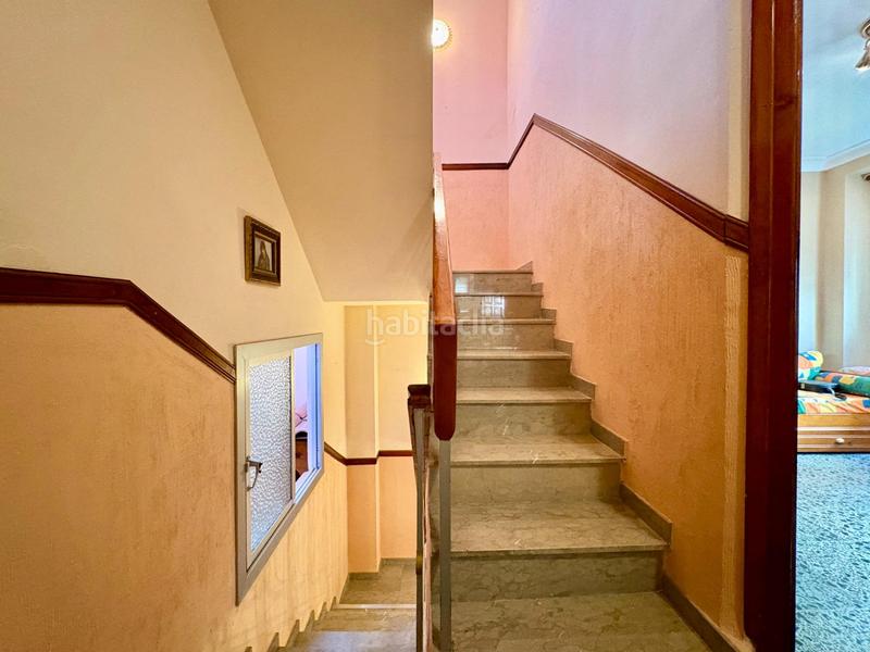 Foto 14cc8932-bc37-4d79-aeee-74a662f0c108. Casa adosada  de 3 plantas en el molinillo en Málaga